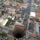 Illustration for article titled Tropical storm Agatha opens up massive, horrifying sinkholes in Guatemala City